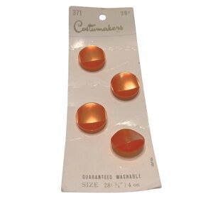 Vintage Costumakers Orange Plastic Buttons in original packaging.